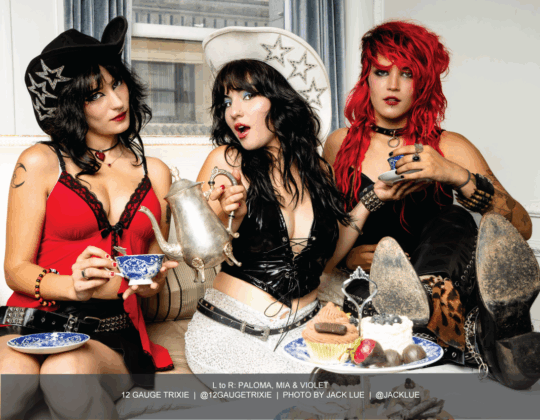 12 Gauge Trixie featured in the May 2025 Guitar Girl Magazine calendar during a stylized tea party scene