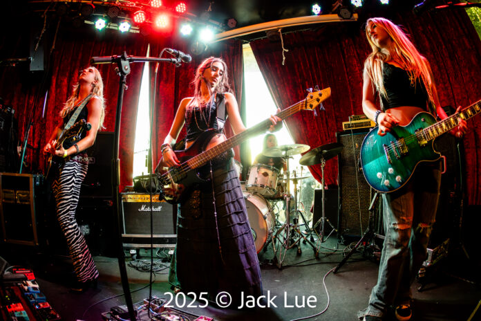 all girl band performing onstage