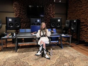 Bella Lam seated at the mixing console inside Nashville’s Blackbird Studio during the recording of “Bootfirst.”